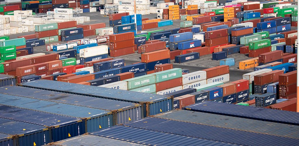Shipping containers stand on the dockside at the Port of Le Havre in Le Havre, France, on Thursday, Sept. 6, 2018. France is benefiting from solid economic expansion in the euro zone after years of European Central Bank stimulus, and a trade dispute with the U.S. that could have led to higher tariffs seems to have subsided for now. Photographer: Christophe Morin/Bloomberg