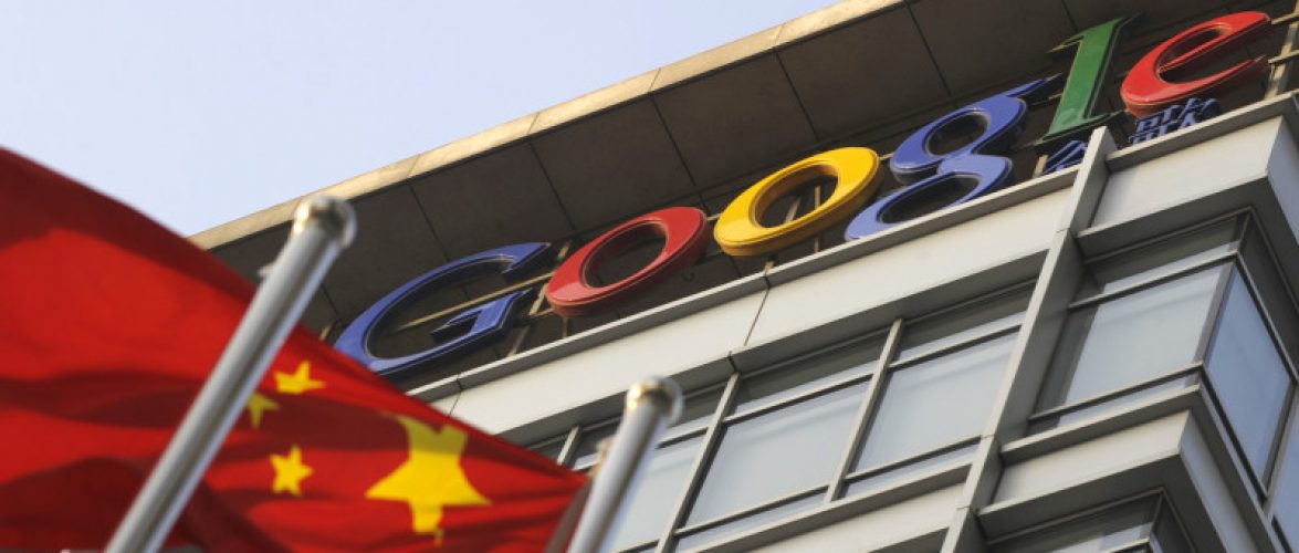 A Chinese flag flies over the company logo outside the Google China headquarters in Beijing on January 14, 2010. AFP PHOTO/LIU Jin (Photo credit should read LIU JIN/AFP/Getty Images)