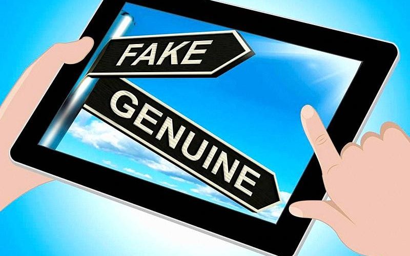 Fake Genuine Tablet Shows Imitation Or Authentic Product.