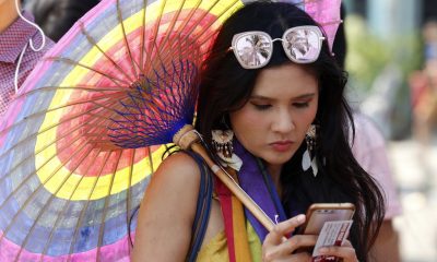 A woman with a rainbow umbrella participates at the Yangon Pride Boat Parade in Yangon, Myanmar, 26 January 2019. Under the theme 'Heroes', the LGBT community celebrates its commitment to acceptance and LGBT rights. Yangon Pride lasts three days with spectacular performances, photography, games, film, competitions.  EPA/NYEIN CHAN NAING. Via 东方IC.