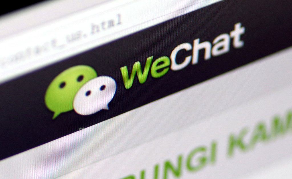 "View of a logo of the messaging app Weixin, or WeChat, of Tencent, in Jinan city, east China's Shandong province, 13 March 2016."