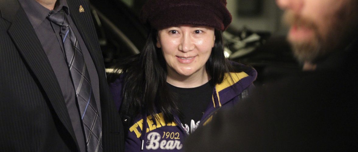 Huawei chief financial officer Meng Wanzhou  arrives in the parkade for a hearing at B.C. Supreme Court in Vancouver, British Columbia, Wednesday, March 6, 2019. The executive was arrested in December at Vancouver's airport at the request of U.S. authorities and Canada announced last week it intends to proceed with the extradition case. (Chad Hipolito/The Canadian Press via AP)