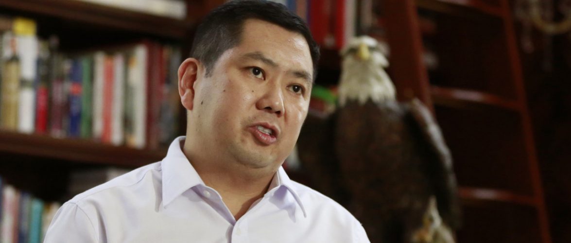 FILE - In this Jan. 14, 2017, file photo, Media Nusantara Citra (MNC) Group President and CEO Hary Tanoesoedibjo gestures during an interview with The Associated Press in Jakarta, Indonesia. Billionaire Hary Tanoesoedibjo founded his own political party and had ambitions to run for Indonesian president in 2019, but now says he’ll support current President Joko Widodo. His company is building two resorts in Indonesia - one in Bali and the other in West Java - that Trump's business is involved with through management and licensing deals. (AP Photo/Achmad Ibrahim, File)