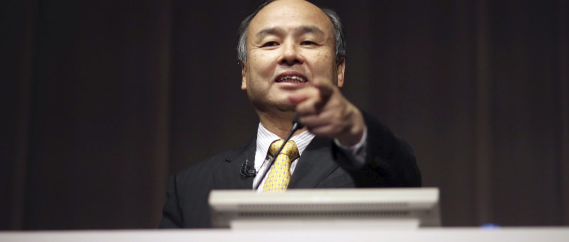 FILE - In this Nov. 4, 2014 file photo, SoftBank founder and Chief Executive Officer Masayoshi Son speaks during a news conference in Tokyo. Japanese Internet company SoftBank Group Corp., which is struggling to turn around Sprint in the U.S., is reporting a 27 percent drop in profit for the fiscal year ended March 31, compared to the previous year. (AP Photo/Eugene Hoshiko, File)  mage source: Tuchong.