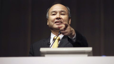 FILE - In this Nov. 4, 2014 file photo, SoftBank founder and Chief Executive Officer Masayoshi Son speaks during a news conference in Tokyo. Japanese Internet company SoftBank Group Corp., which is struggling to turn around Sprint in the U.S., is reporting a 27 percent drop in profit for the fiscal year ended March 31, compared to the previous year. (AP Photo/Eugene Hoshiko, File)  mage source: Tuchong.