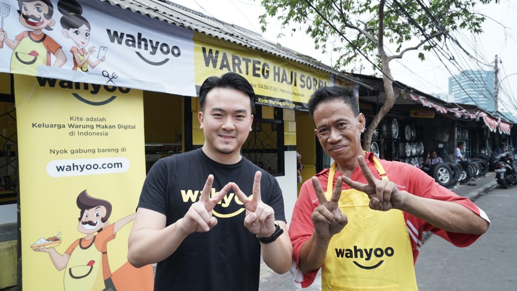 Wahyoo's CEO Peter Shearer and warteg partner
