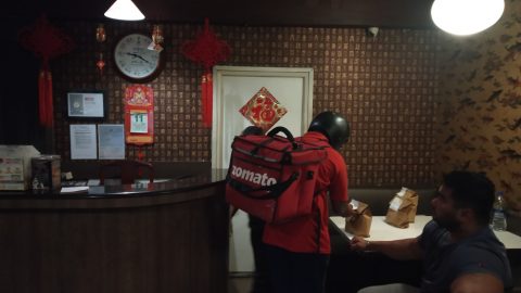 A delivery person from Zomato picking up order from a restaurant in Bengaluru. Picture by Avanish Tiwary