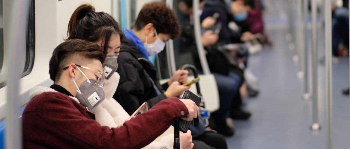 People wearing masks on a subway in Shanghai. Source: Shutterstock.