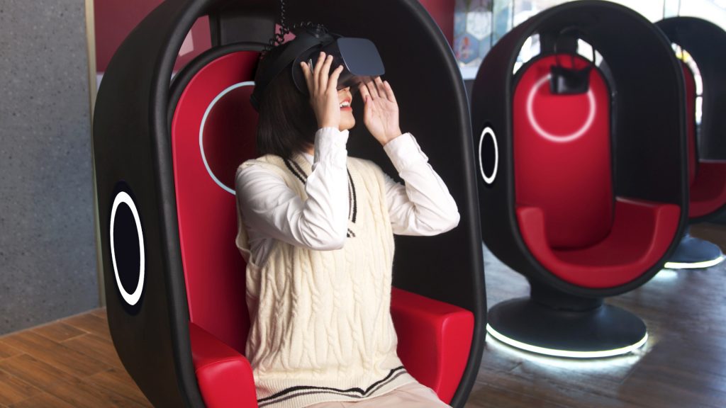 A woman is watching a VR movie in 
