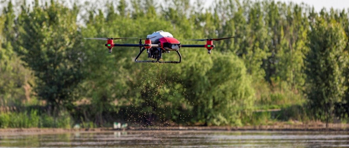 An XAG drone, attached with the company’s JetSeed granule system, scatters rice seeds at a farm in the Zengcheng District of Guangzhou, capital of southern Guangdong province. Courtesy of XAG via South China Morning Post.