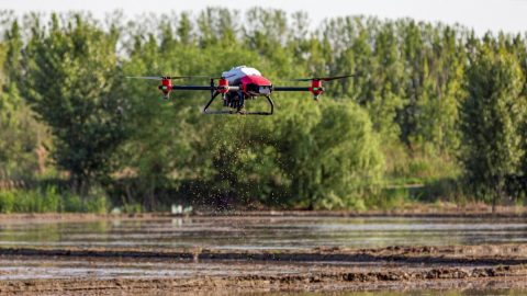 An XAG drone, attached with the company’s JetSeed granule system, scatters rice seeds at a farm in the Zengcheng District of Guangzhou, capital of southern Guangdong province. Courtesy of XAG via South China Morning Post.