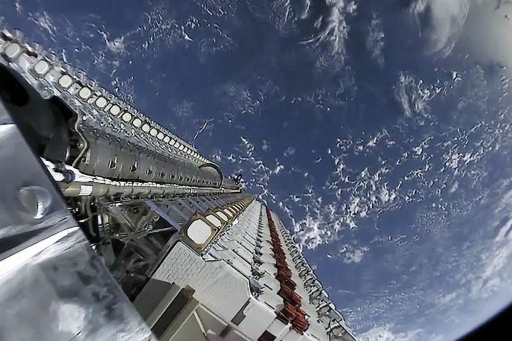 Satellites that will form part of SpaceX's Starlink constellation await release into orbit from a Falcon 9 rocket on May 24. Courtesy of SpaceX via Abacus News.