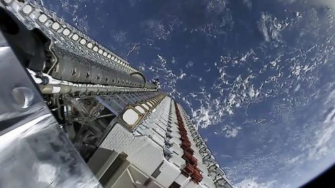Satellites that will form part of SpaceX's Starlink constellation await release into orbit from a Falcon 9 rocket on May 24. Courtesy of SpaceX via Abacus News.
