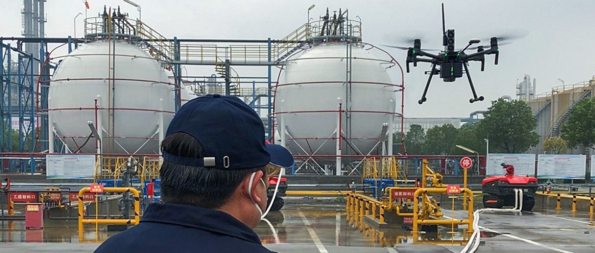 An inspector checks air quality with the help of a drone equipped with the Sniffer4D sensor. Courtesy of Soarability via South China Morning Post.