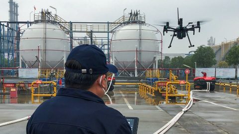 An inspector checks air quality with the help of a drone equipped with the Sniffer4D sensor. Courtesy of Soarability via South China Morning Post.