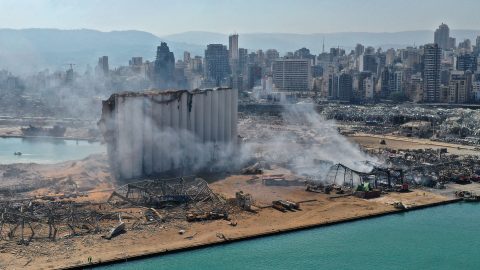 An aerial view shows the massive damage done to Beirut port's grain silos and the area around it on August 5, 2020, one day after a mega-blast tore through the harbor in the heart of the Lebanese capital. Source: Shutterstock.
