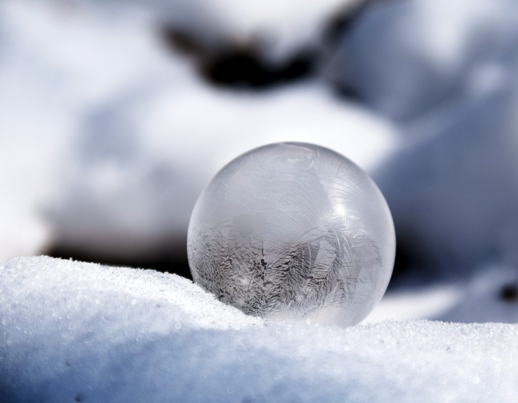 A frosted ice ball. Image by Ulrike Leone from Pixabay.