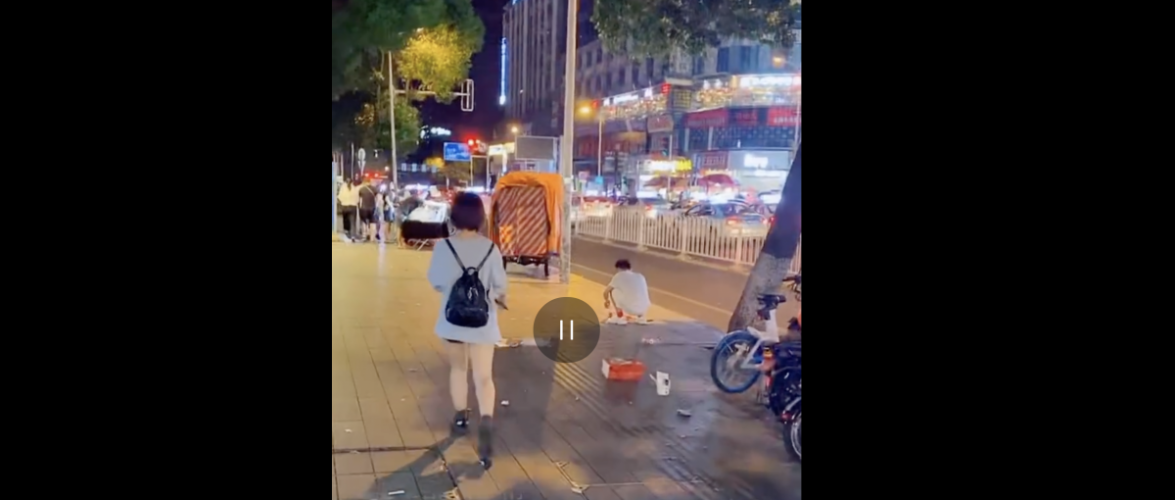 A livestreamer films himself following young women on the street before being banned from the Douyin platform. Screenshot from Douyin via Weibo and South China Morning Post.