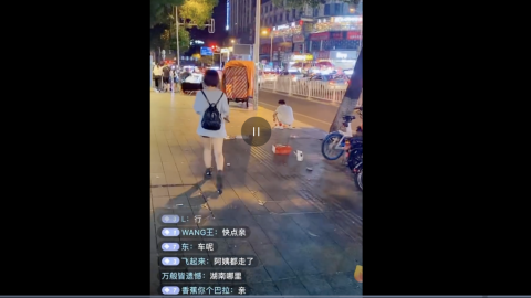 A livestreamer films himself following young women on the street before being banned from the Douyin platform. Screenshot from Douyin via Weibo and South China Morning Post.