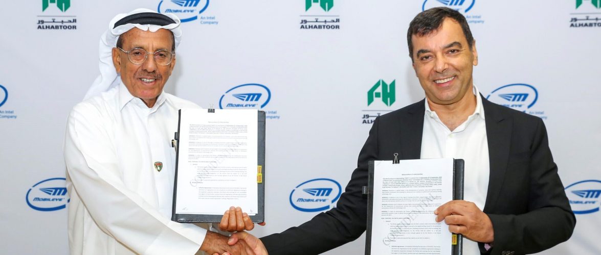 Mobileye's Amnon Shashua and Khalaf Ahmad Al Habtoor, founding chairman of Al Habtoor Group, sign a strategic partnership deal to deploy self-driving vehicles in Dubai. Courtesy of Mobileye via NoCamels.