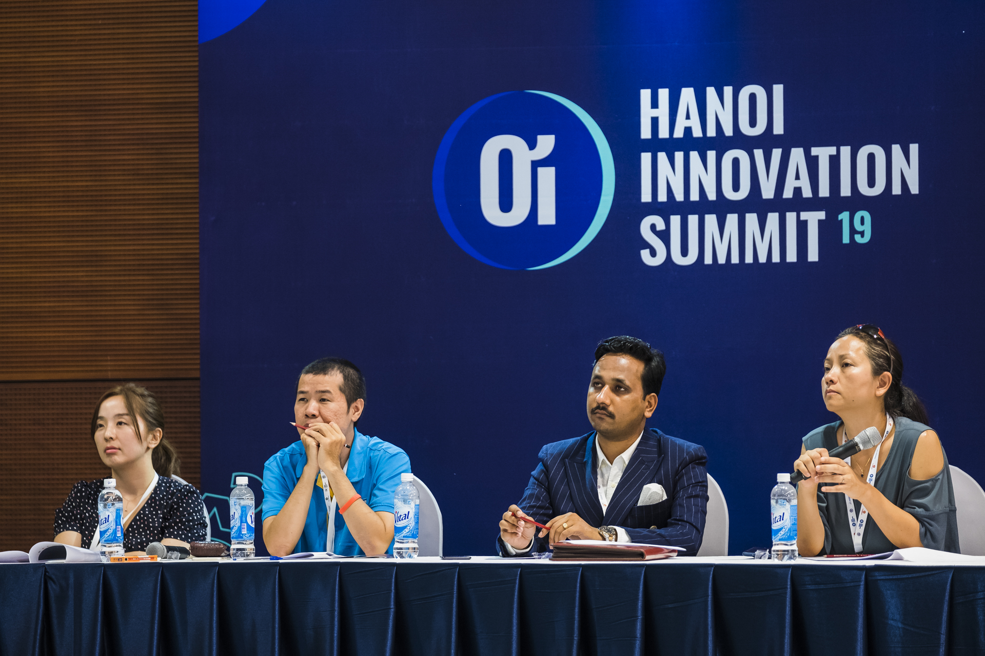 Carman Chan (far right) sits on a panel at the 2019 Hanoi Innovation Summit. 