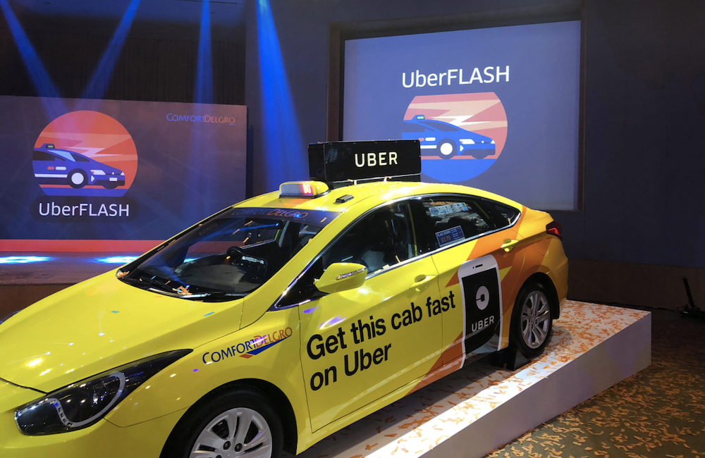 Singapore’s biggest taxi firm ComfortDelGro to trial ride-hailing service
