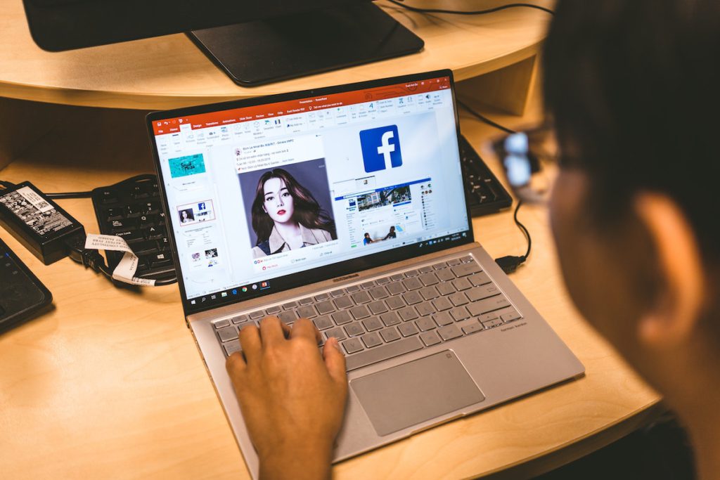 Facebook on web by Nghia Nguyen on Unsplash.