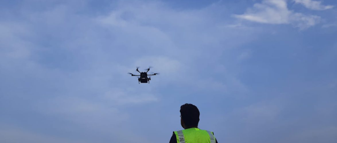 A pilot from Anra Technologies operating a drone.