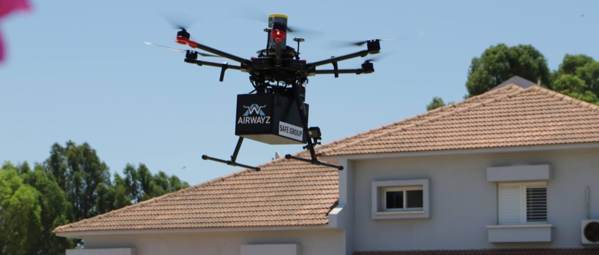 A delivery drone flies over a residential neighborhood in Hadera in June 2021. Photo by Aviv Bar-Zohar. Courtesy of Airwayz via NoCamels.