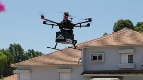 A delivery drone flies over a residential neighborhood in Hadera in June 2021. Photo by Aviv Bar-Zohar. Courtesy of Airwayz via NoCamels.