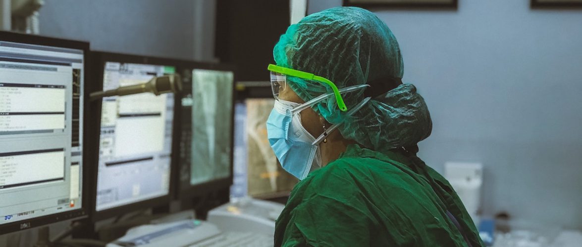 Medical personnel in COVID hospital. photo by Irwan Iwe on Unsplash.