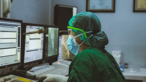 Medical personnel in COVID hospital. photo by Irwan Iwe on Unsplash.