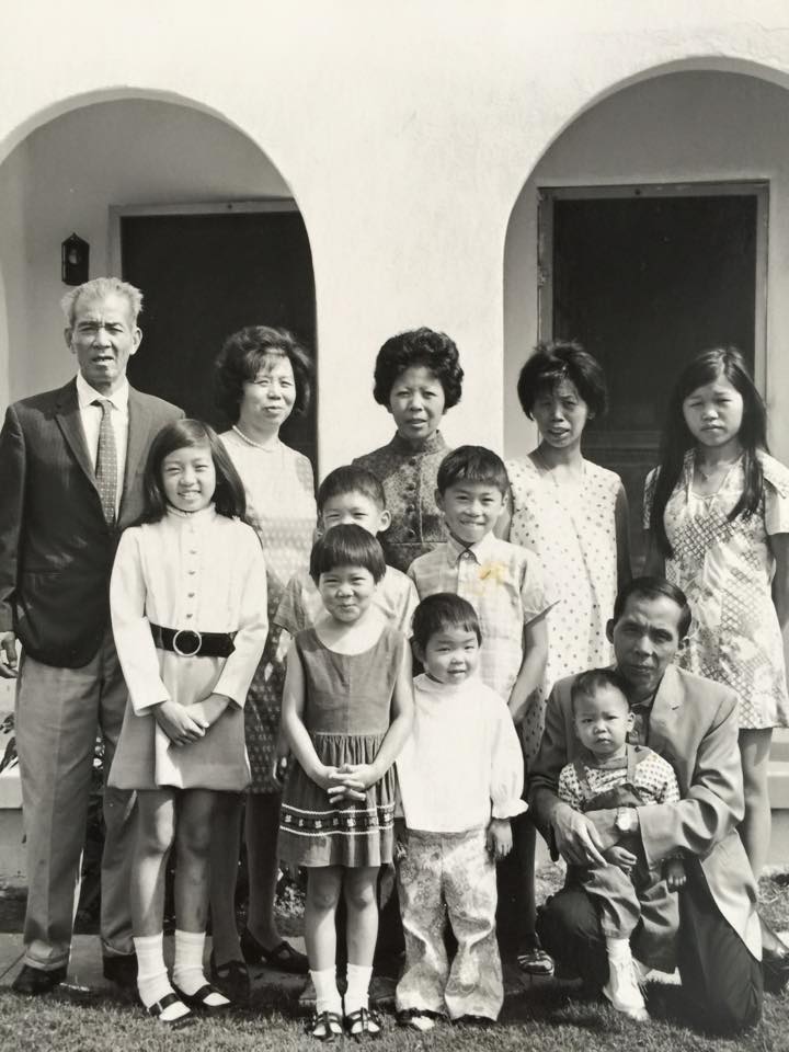 My family in front of house in Watts in LA with sisters from China, Rosaline Koo from CXA Group