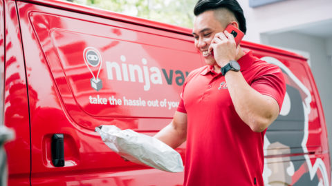 Ninja Van delivery personnel calling a customer. Courtesy of Ninja Van.