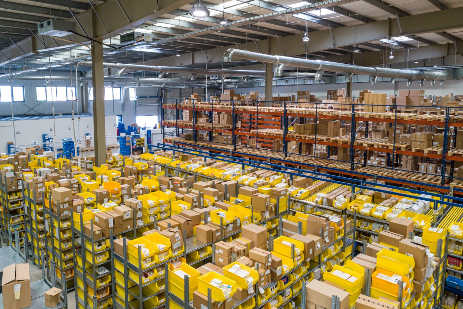 Amazon's warehouse. Photo from Unsplash by
Adrian Sulyok.