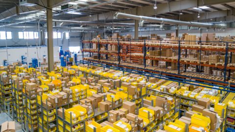 Amazon's warehouse. Photo from Unsplash by 
Adrian Sulyok. 