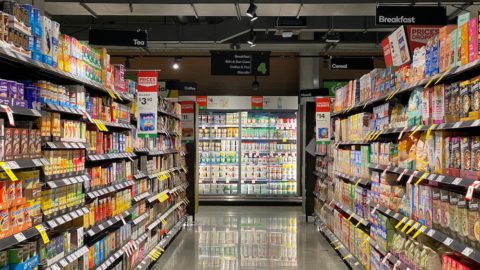 Supermarket aisle. Photo by Franki Chamaki on Unsplash.