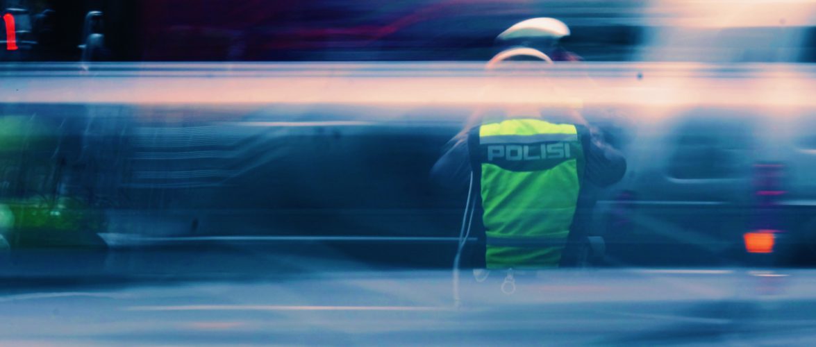 Indonesian police by Tusik on Unsplash.