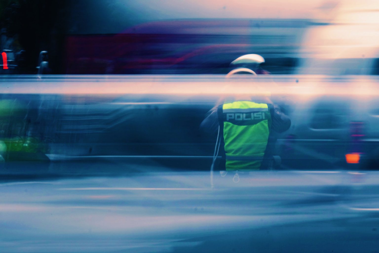 Indonesian police by Tusik on Unsplash.