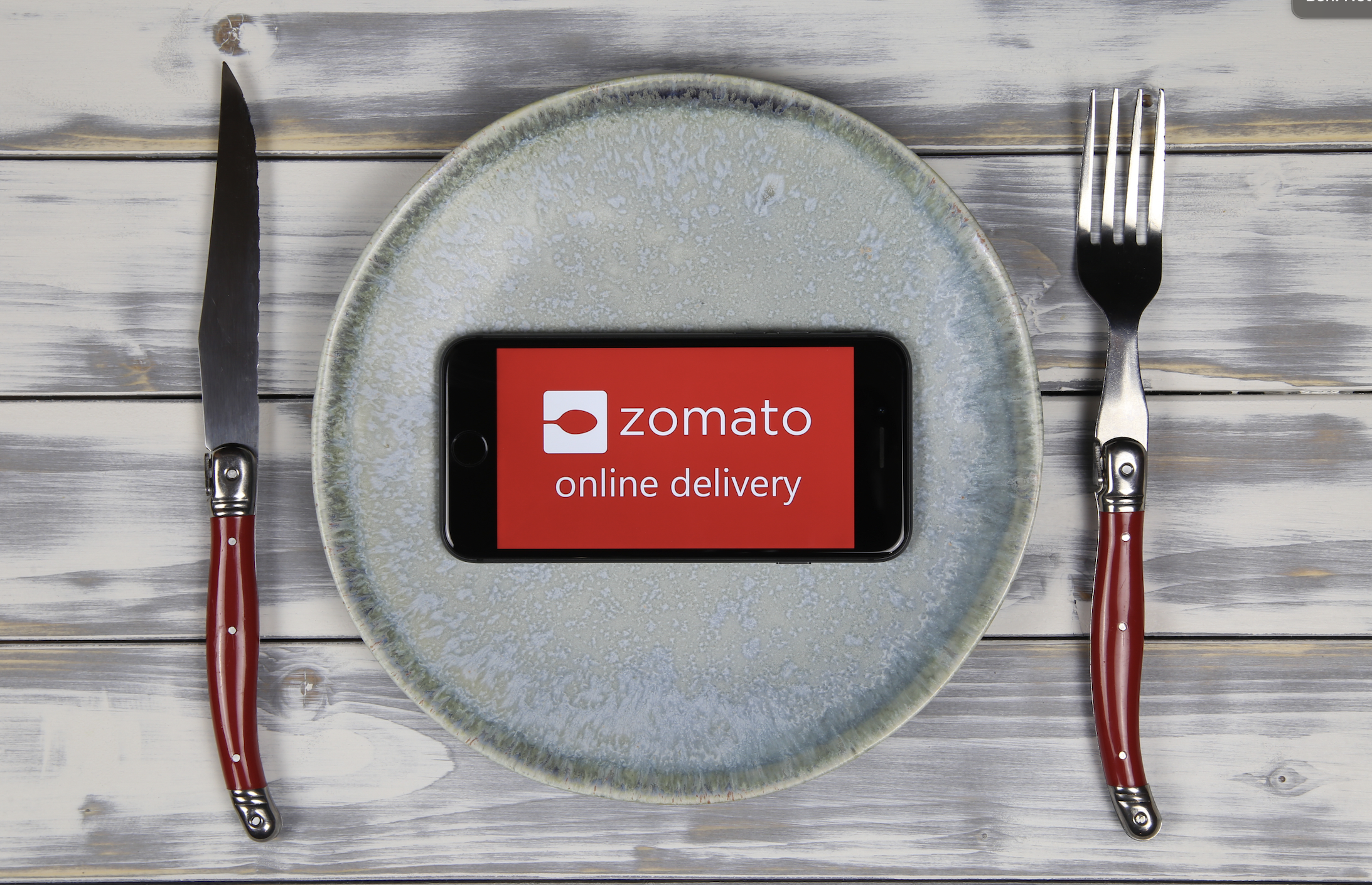 Zomato posts widened losses for Q3 2021, announces investments in Curefit, Shiprocket
