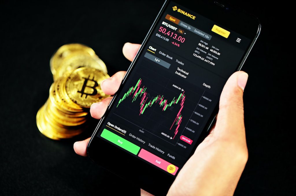 Binance platform in an Android phone. Photo by Nikon Corporation on Unsplash.