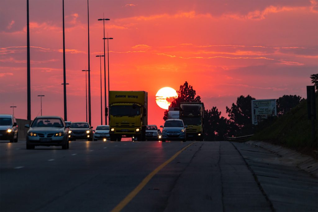 Photo of vehicles on a highway road.