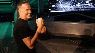 GIF of video showcasing Franz von Holzhausen, chief designer of Tesla, tossing a baseball at the window of the Cybertruck during the delivery event on November 30.
