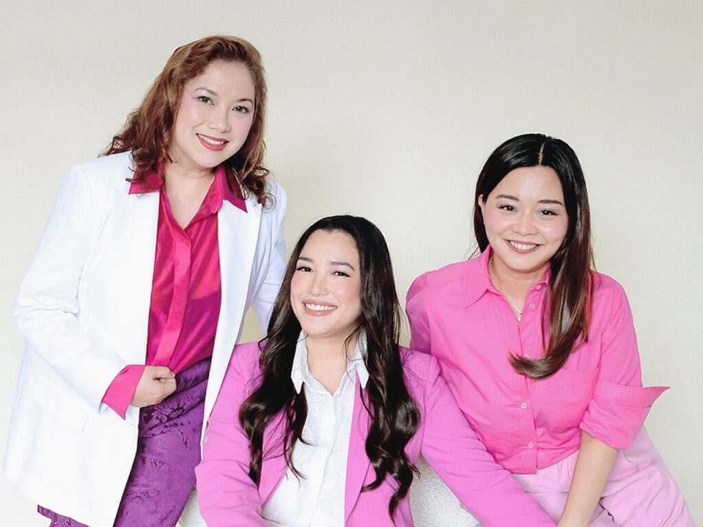 Photo of Judith Sullivan (left), Jessica de Mesa-Lim (center), and Isabel Lim. The trio undertakes the roles of chief medical officer, CEO, and CEO at Kindred Health, respectively.