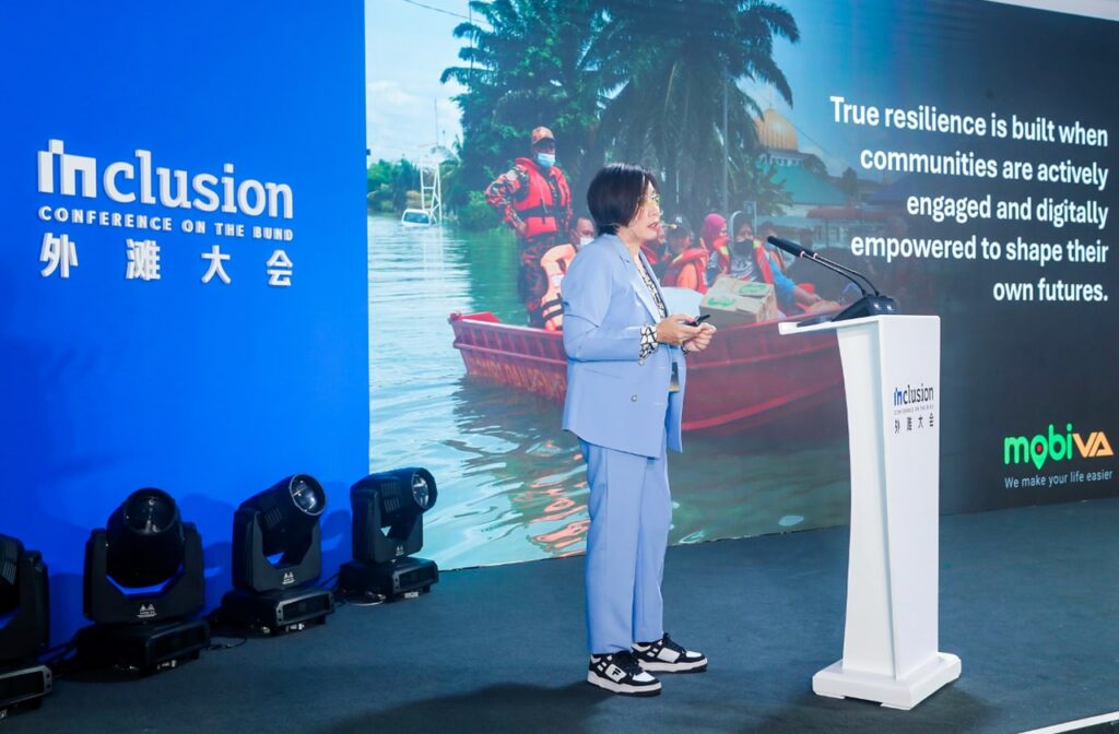 Photo of Wendy Leong, founder and CEO of Mobiva, speaking during the Inclusion Conference held in Shanghai.