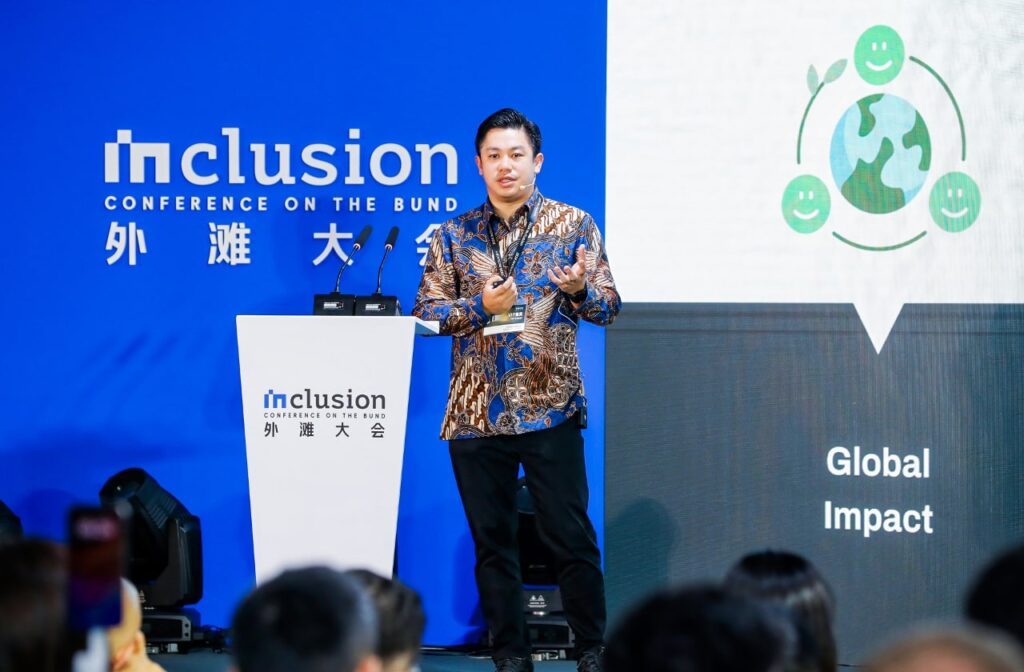 Photo of Joseph Aditya, founder and CEO of Ralali.com, speaking during the Inclusion Conference held in Shanghai.