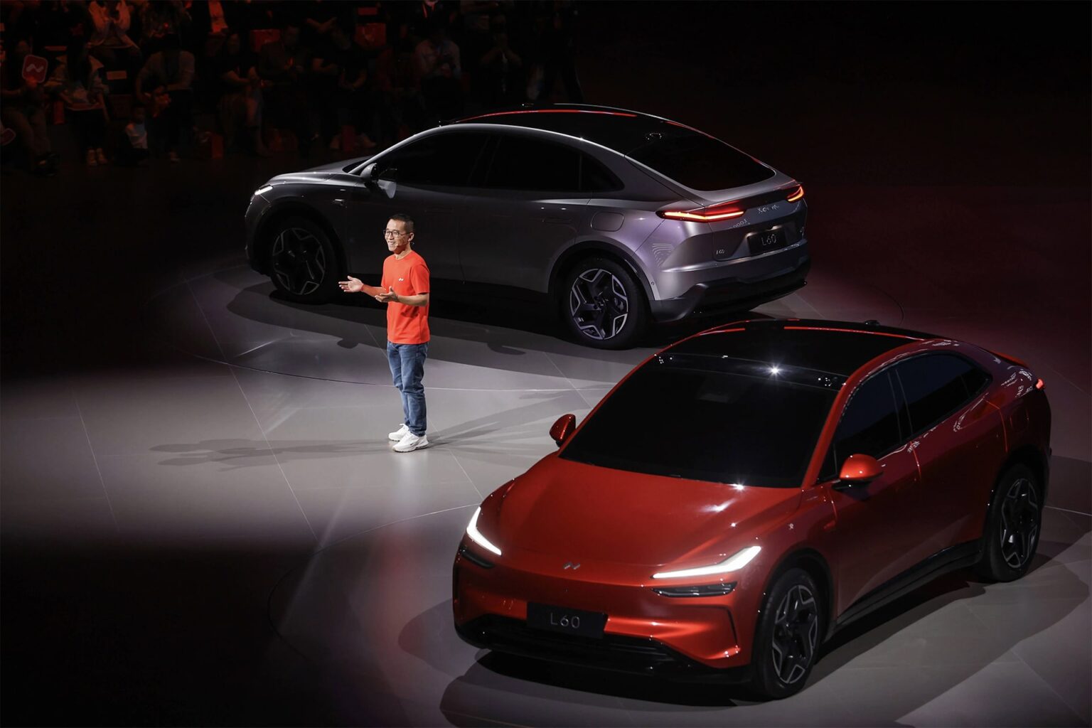 Photo of Alan Ai revealing the Onvo L60 electric vehicle at its unveiling event in May 2024. Photo and header photo courtesy of Nio.