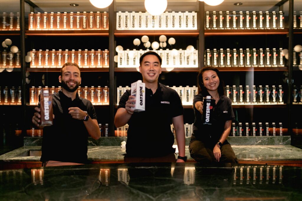 Photo of Oatside’s senior team members. From left to right: Gabriel Farnezi (commercial director), Benedict Lim (founder and CEO), and Cindy Lin (marketing director).