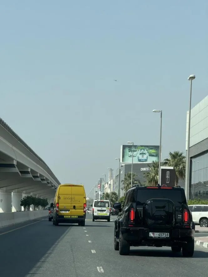 Photo shows a black Jetour T2 being driven on a road in Dubai.