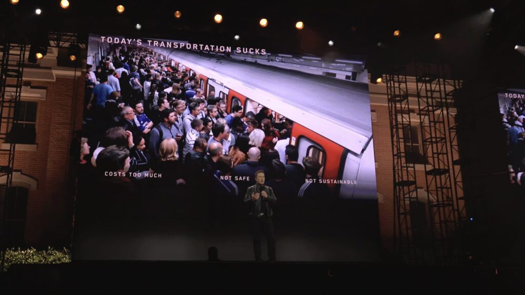 Image of Elon Musk speaking on stage at Tesla's October 10 event.